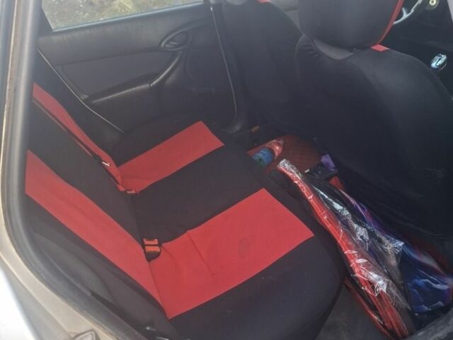 Сірий Форд Фокус, об'ємом двигуна 1.8 л та пробігом 225 тис. км за 2601 $, фото 4 на Automoto.ua