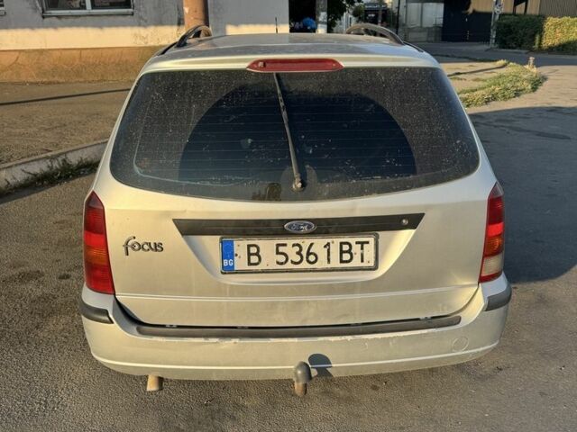 Серый Форд Фокус, объемом двигателя 1.8 л и пробегом 350 тыс. км за 1500 $, фото 1 на Automoto.ua