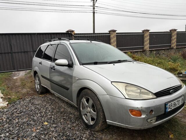 Серый Форд Фокус, объемом двигателя 1.8 л и пробегом 370 тыс. км за 848 $, фото 4 на Automoto.ua