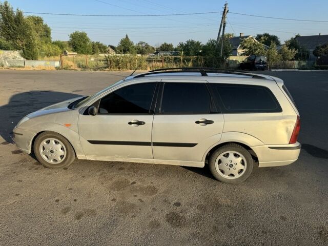 Серый Форд Фокус, объемом двигателя 1.8 л и пробегом 350 тыс. км за 1500 $, фото 2 на Automoto.ua