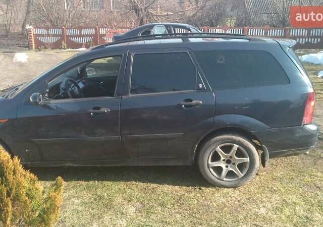 Серый Форд Фокус, объемом двигателя 1.8 л и пробегом 376 тыс. км за 2400 $, фото 20 на Automoto.ua