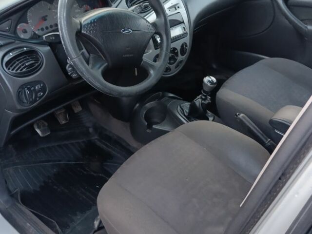 Серый Форд Фокус, объемом двигателя 1.8 л и пробегом 350 тыс. км за 1497 $, фото 4 на Automoto.ua