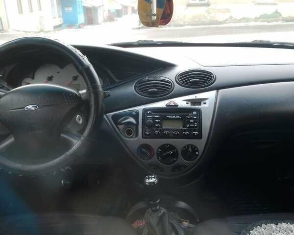 Серый Форд Фокус, объемом двигателя 1.8 л и пробегом 352 тыс. км за 2500 $, фото 34 на Automoto.ua