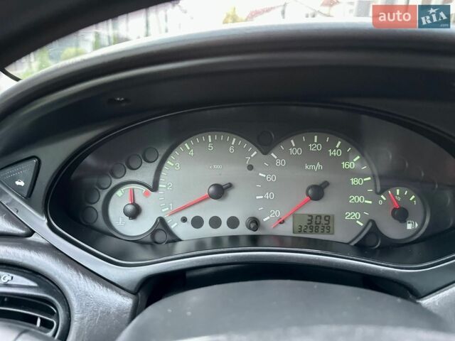 Сірий Форд Фокус, об'ємом двигуна 1.6 л та пробігом 329 тис. км за 1999 $, фото 25 на Automoto.ua