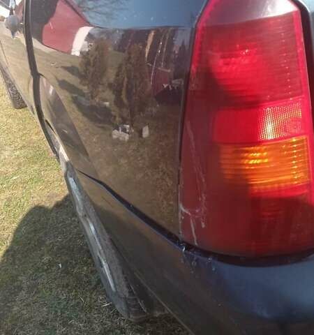 Серый Форд Фокус, объемом двигателя 1.8 л и пробегом 376 тыс. км за 2400 $, фото 13 на Automoto.ua