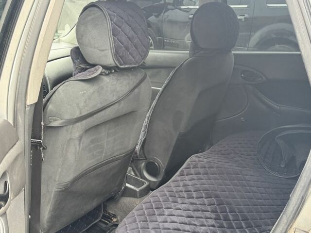 Серый Форд Фокус, объемом двигателя 1.8 л и пробегом 290 тыс. км за 2350 $, фото 5 на Automoto.ua