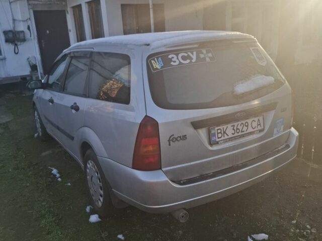 Сірий Форд Фокус, об'ємом двигуна 1.8 л та пробігом 225 тис. км за 2601 $, фото 6 на Automoto.ua