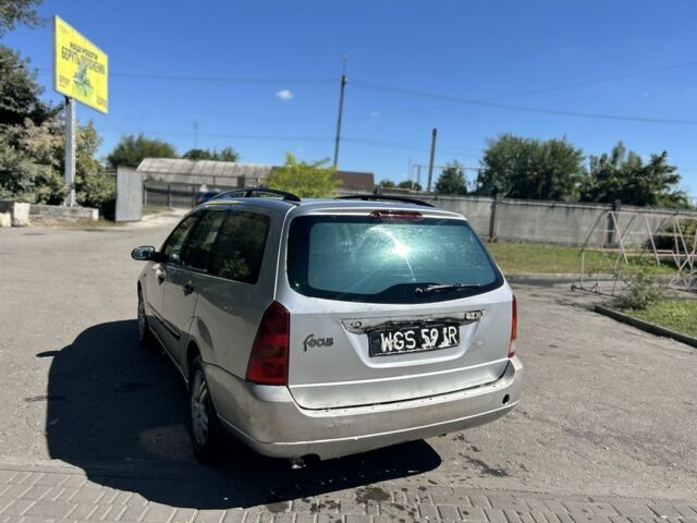 Серый Форд Фокус, объемом двигателя 1.8 л и пробегом 200 тыс. км за 1506 $, фото 5 на Automoto.ua