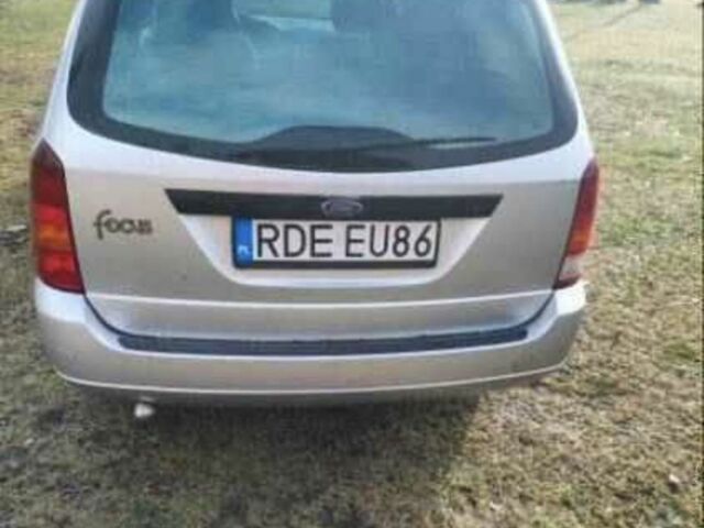 Серый Форд Фокус, объемом двигателя 1.8 л и пробегом 290 тыс. км за 1200 $, фото 2 на Automoto.ua