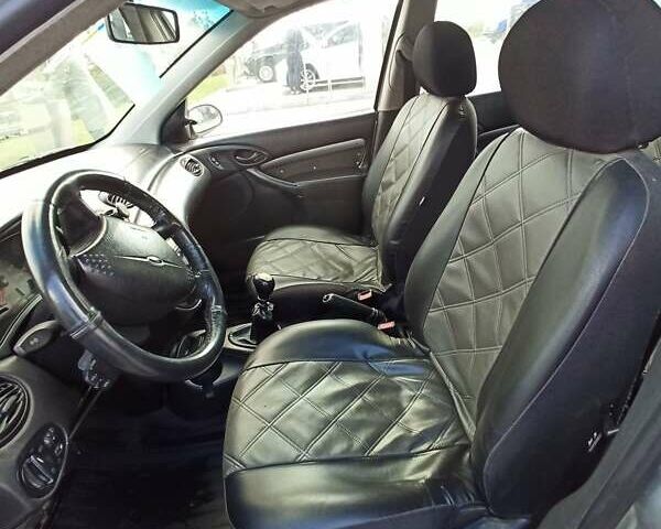 Сірий Форд Фокус, об'ємом двигуна 1.8 л та пробігом 330 тис. км за 3750 $, фото 20 на Automoto.ua