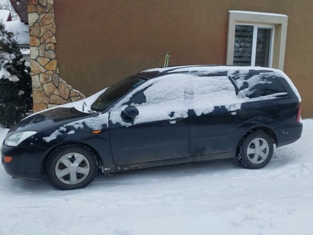 Серый Форд Фокус, объемом двигателя 1.8 л и пробегом 250 тыс. км за 1000 $, фото 5 на Automoto.ua