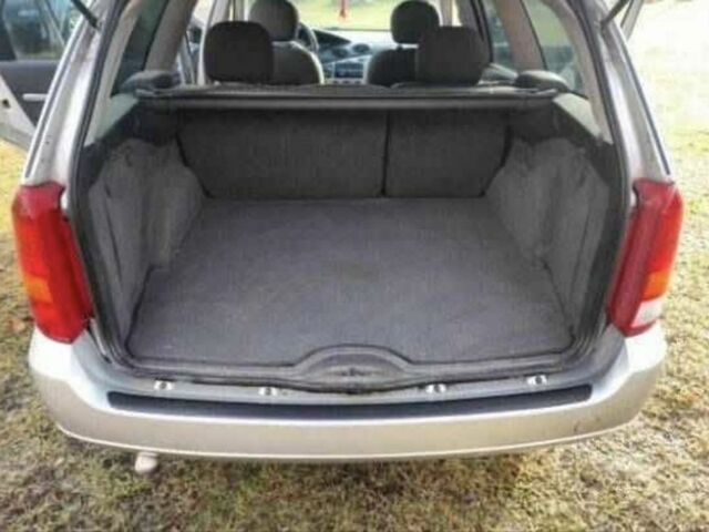 Серый Форд Фокус, объемом двигателя 1.8 л и пробегом 290 тыс. км за 1200 $, фото 5 на Automoto.ua