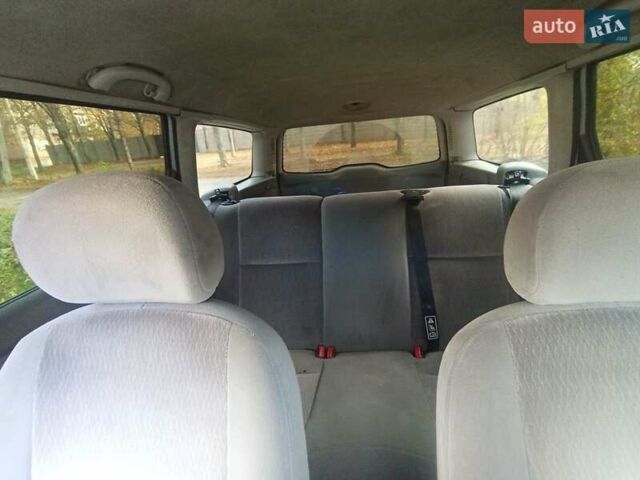 Сірий Форд Фокус, об'ємом двигуна 2 л та пробігом 284 тис. км за 4000 $, фото 7 на Automoto.ua