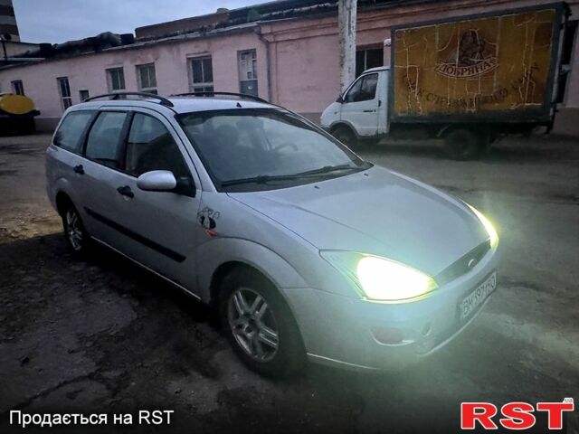 Серый Форд Фокус, объемом двигателя 1.8 л и пробегом 400 тыс. км за 2100 $, фото 1 на Automoto.ua