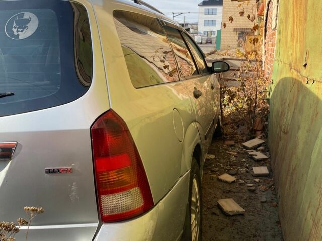 Серый Форд Фокус, объемом двигателя 1.8 л и пробегом 360 тыс. км за 2000 $, фото 4 на Automoto.ua