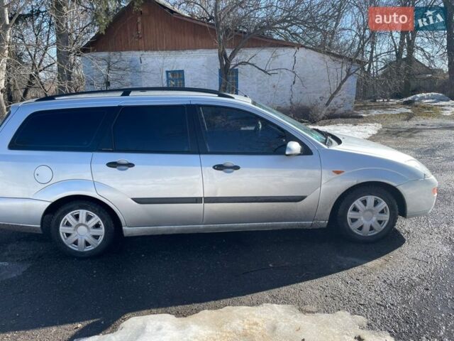 Серый Форд Фокус, объемом двигателя 1.39 л и пробегом 370 тыс. км за 2950 $, фото 4 на Automoto.ua