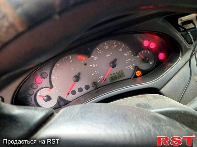 Серый Форд Фокус, объемом двигателя 1.8 л и пробегом 406 тыс. км за 2700 $, фото 3 на Automoto.ua