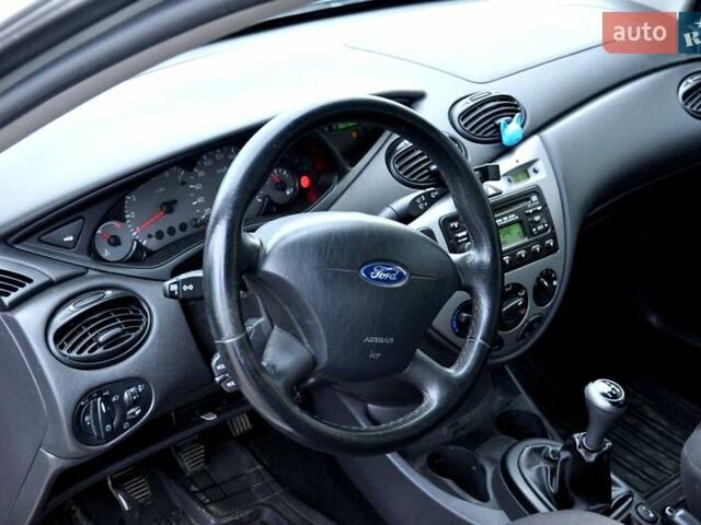 Серый Форд Фокус, объемом двигателя 1.8 л и пробегом 150 тыс. км за 3600 $, фото 16 на Automoto.ua