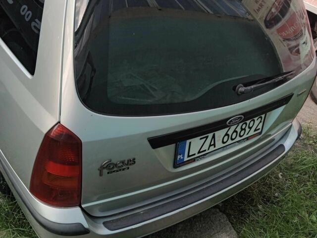 Серый Форд Фокус, объемом двигателя 1.8 л и пробегом 300 тыс. км за 1200 $, фото 3 на Automoto.ua