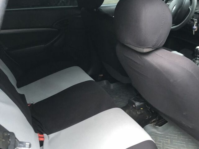 Серый Форд Фокус, объемом двигателя 1.8 л и пробегом 470 тыс. км за 900 $, фото 6 на Automoto.ua