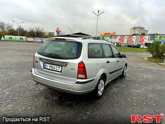 Серый Форд Фокус, объемом двигателя 1.8 л и пробегом 246 тыс. км за 2500 $, фото 3 на Automoto.ua