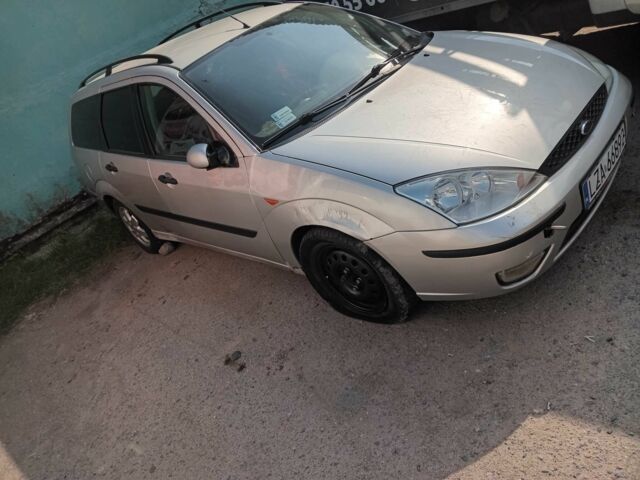 Серый Форд Фокус, объемом двигателя 1.8 л и пробегом 300 тыс. км за 1200 $, фото 2 на Automoto.ua