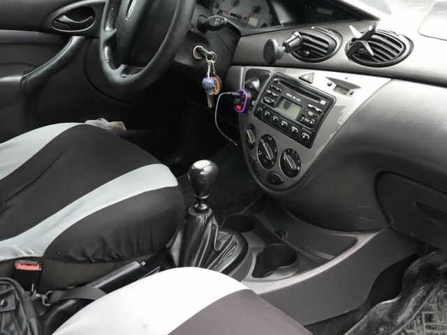 Серый Форд Фокус, объемом двигателя 1.8 л и пробегом 470 тыс. км за 900 $, фото 5 на Automoto.ua