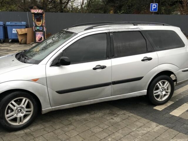 Серый Форд Фокус, объемом двигателя 1.8 л и пробегом 470 тыс. км за 900 $, фото 1 на Automoto.ua