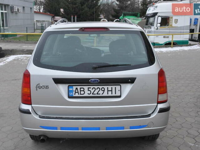 Серый Форд Фокус, объемом двигателя 1.8 л и пробегом 150 тыс. км за 3600 $, фото 9 на Automoto.ua