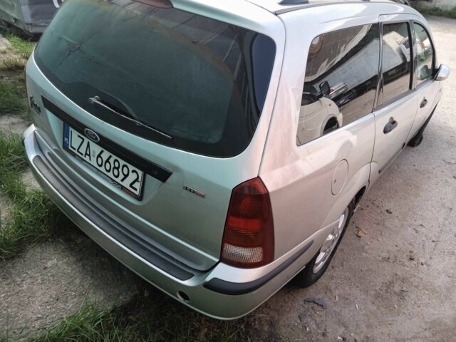 Серый Форд Фокус, объемом двигателя 1.8 л и пробегом 300 тыс. км за 1200 $, фото 4 на Automoto.ua