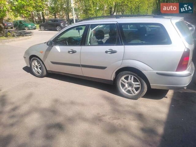 Серый Форд Фокус, объемом двигателя 1.8 л и пробегом 300 тыс. км за 3000 $, фото 7 на Automoto.ua