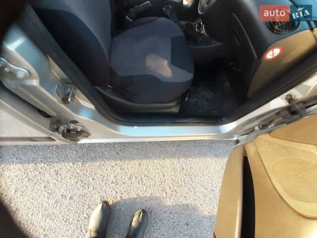 Сірий Форд Фокус, об'ємом двигуна 1.8 л та пробігом 314 тис. км за 3999 $, фото 11 на Automoto.ua