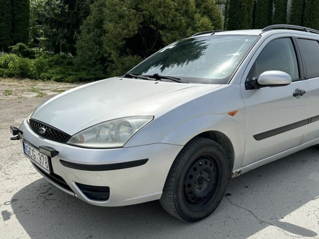 Серый Форд Фокус, объемом двигателя 1.8 л и пробегом 327 тыс. км за 1309 $, фото 3 на Automoto.ua