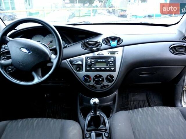 Серый Форд Фокус, объемом двигателя 1.8 л и пробегом 150 тыс. км за 3600 $, фото 25 на Automoto.ua