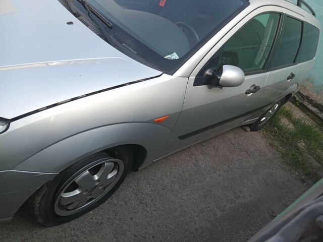 Серый Форд Фокус, объемом двигателя 1.8 л и пробегом 300 тыс. км за 1200 $, фото 1 на Automoto.ua