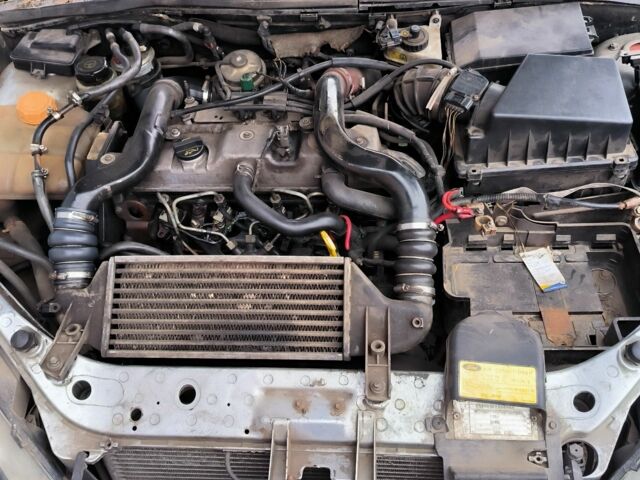 Серый Форд Фокус, объемом двигателя 1.8 л и пробегом 200 тыс. км за 750 $, фото 7 на Automoto.ua