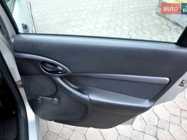 Серый Форд Фокус, объемом двигателя 1.8 л и пробегом 150 тыс. км за 3600 $, фото 22 на Automoto.ua