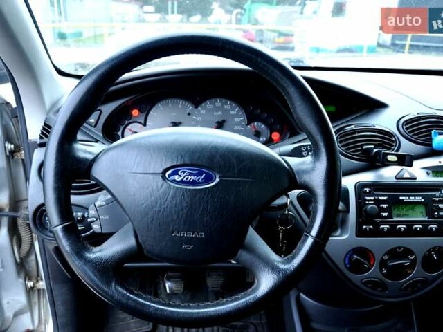 Серый Форд Фокус, объемом двигателя 1.8 л и пробегом 150 тыс. км за 3600 $, фото 34 на Automoto.ua