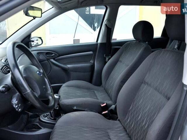 Серый Форд Фокус, объемом двигателя 1.8 л и пробегом 150 тыс. км за 3600 $, фото 17 на Automoto.ua