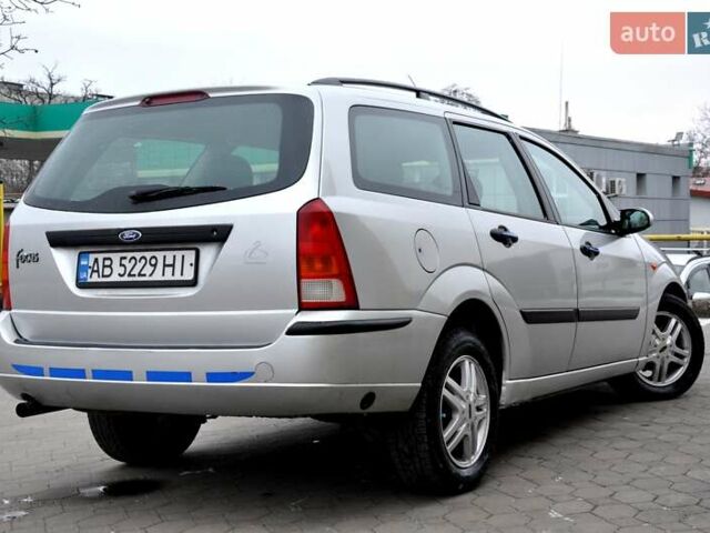 Серый Форд Фокус, объемом двигателя 1.8 л и пробегом 150 тыс. км за 3600 $, фото 36 на Automoto.ua