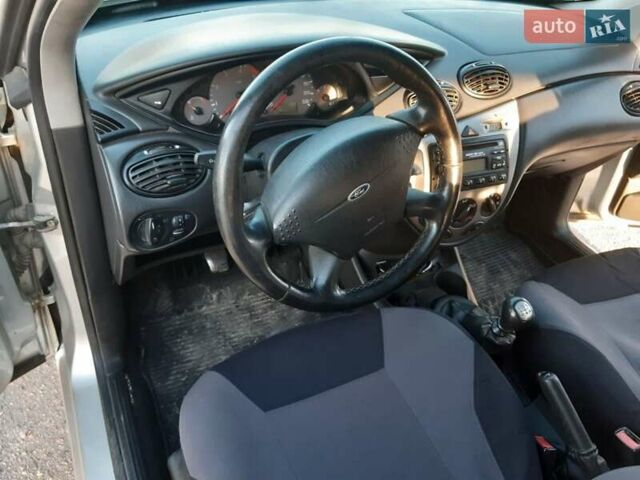 Сірий Форд Фокус, об'ємом двигуна 1.8 л та пробігом 314 тис. км за 3999 $, фото 6 на Automoto.ua
