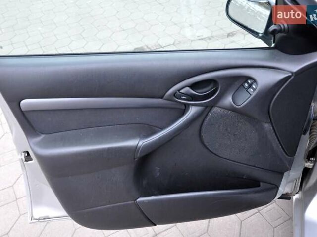 Серый Форд Фокус, объемом двигателя 1.8 л и пробегом 150 тыс. км за 3600 $, фото 14 на Automoto.ua