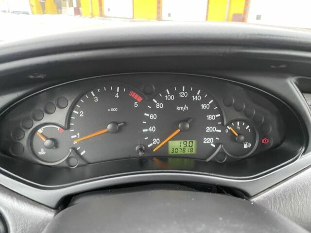 Серый Форд Фокус, объемом двигателя 1.8 л и пробегом 307 тыс. км за 2850 $, фото 11 на Automoto.ua