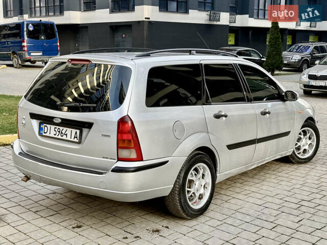 Серый Форд Фокус, объемом двигателя 1.8 л и пробегом 290 тыс. км за 2850 $, фото 11 на Automoto.ua