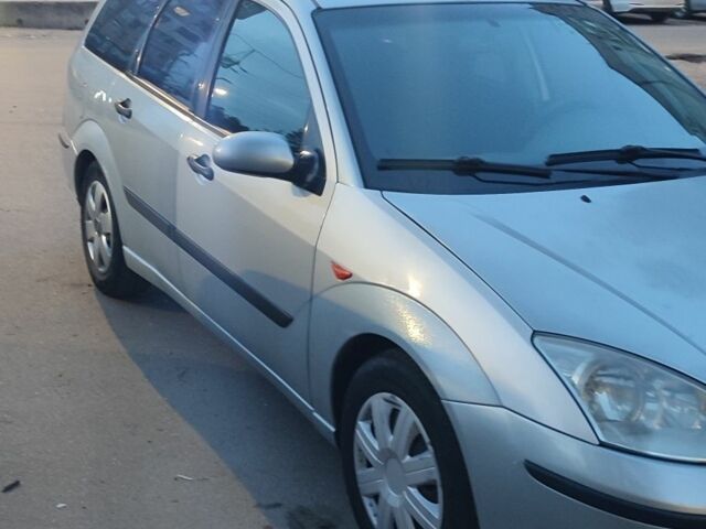 Серый Форд Фокус, объемом двигателя 1.8 л и пробегом 320 тыс. км за 3000 $, фото 1 на Automoto.ua