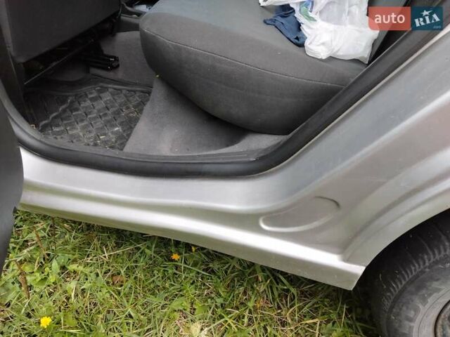 Серый Форд Фокус, объемом двигателя 1.8 л и пробегом 245 тыс. км за 4500 $, фото 30 на Automoto.ua