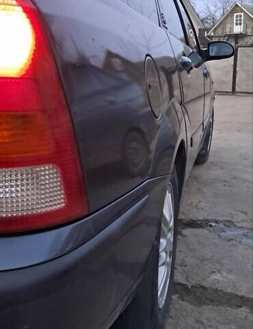 Серый Форд Фокус, объемом двигателя 1.8 л и пробегом 336 тыс. км за 3950 $, фото 19 на Automoto.ua