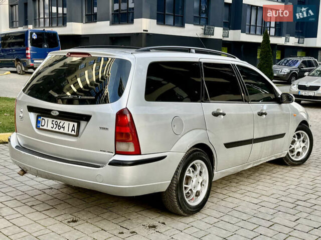 Серый Форд Фокус, объемом двигателя 1.8 л и пробегом 290 тыс. км за 2850 $, фото 12 на Automoto.ua