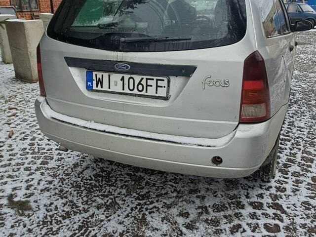 Серый Форд Фокус, объемом двигателя 1.8 л и пробегом 240 тыс. км за 1350 $, фото 4 на Automoto.ua
