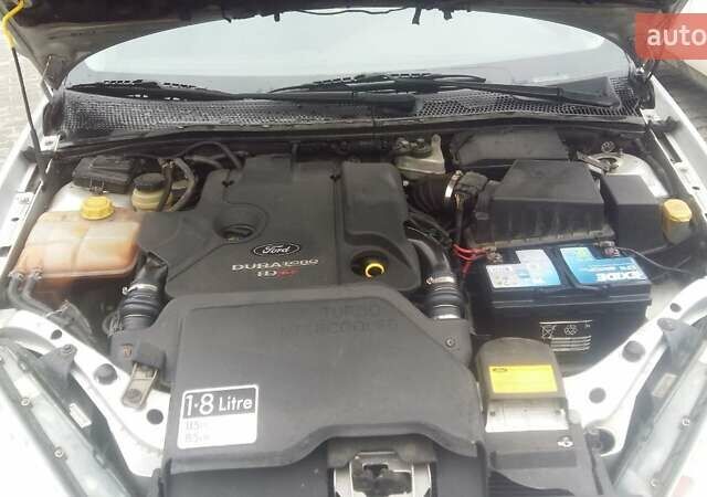 Серый Форд Фокус, объемом двигателя 1.8 л и пробегом 245 тыс. км за 4500 $, фото 37 на Automoto.ua